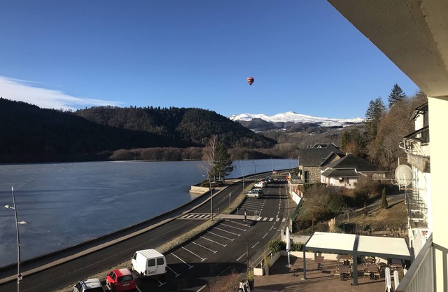 Luxury apartment with terrace on the shores of Lake Chambon overlooking Sancy
