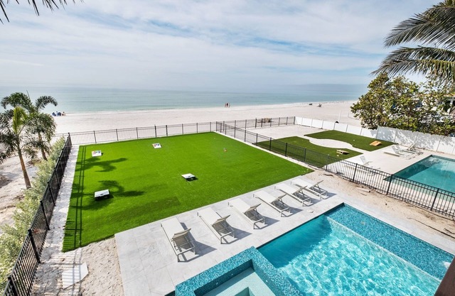 Luxury Beachfront Home with Pool, Golf Cart and Bikes Included!