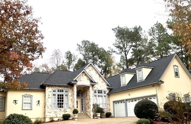 LUXURY EXECUTIVE GOLF RETREAT! 4 beds 3 full baths Golf course view of hole #1