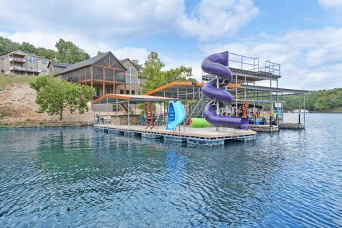 Luxury Home on Cove with Boat Slips, Waterslides, and Jump Deck