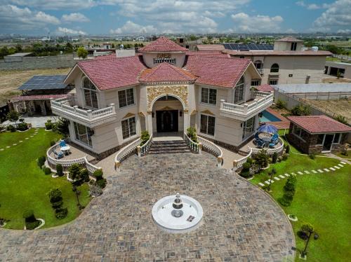 Luxury Hotel Near Islamabad Airport- BBQ, Pool, Waterfall, Gazebose