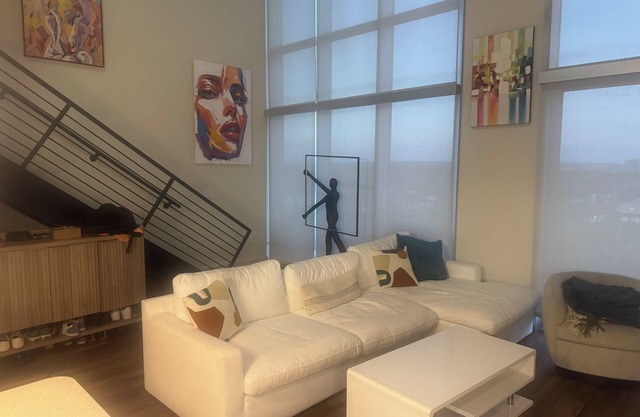 Luxury Loft Penthouse in the Heart of the City with Skyline Views – 1BR, 1.5BA