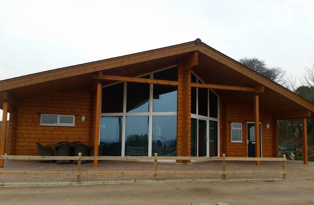 Luxury log cabin in beautiful surroundings with stunning views near Cardiff.