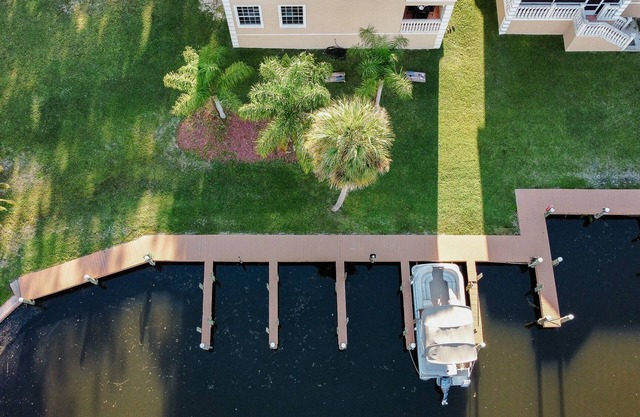 Luxury River Home w/boat ramp, dock, parking, EV Charger, Kayak & golf cart.