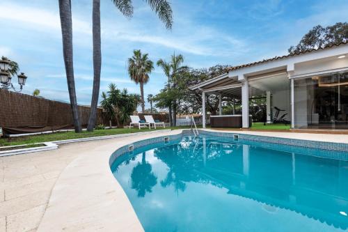 Luxury Villa with Heated Pool, Jacuzzi, Gym, and Gardens