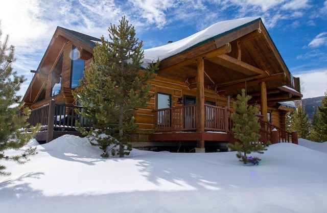 Miles Behind Log Cabin by Stay Winter Park