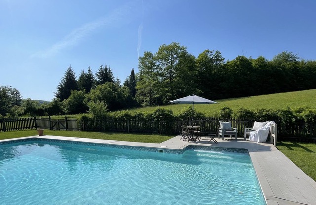 Modern Farmhouse with Sauna & Pool on 100+ Acres.