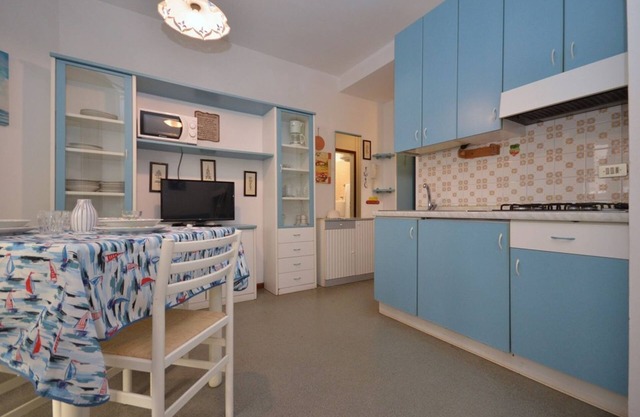 Modern functional studio with balcony in Lignano