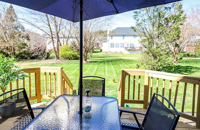 Modern home in North Raleigh surrounded by Falls of Lake in Wakefield plantation