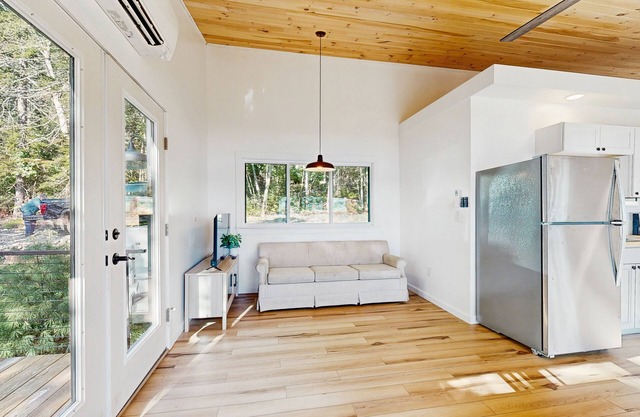 Modern Maine cottage with river views, deck, and a convenient washer/dryer