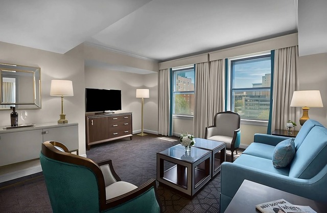 Modern Suite w/Living & Dining Areas! Pets Allowed! W/Parking, Pool & Cinema!