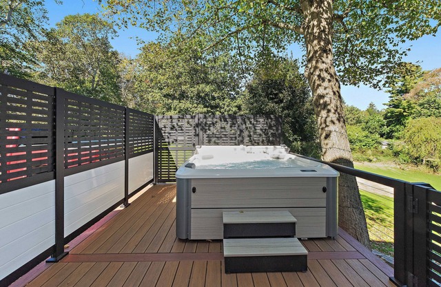 Modern Waterfront Retreat with Hot Tub & Pond Views/Pet-Friendly!