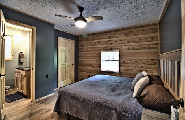 Moonshine Cabin with a nice yard on the creek in the shadows of the Smokies