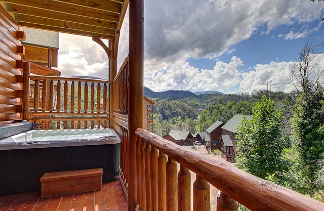 Mountain view, sleeps 14, pool table, arcade game, and hot tub! Plenty of space!