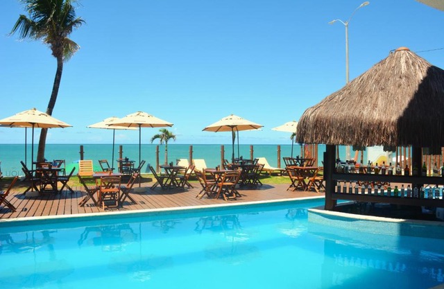 Na praia - Elegance 502 Luxo - Lateral vista mar