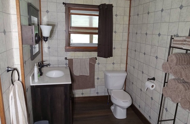 Nestled is the word for this country setting. Country living in its purest form.