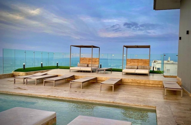 New apartment with view to the ocean, just steps away from the beach to enjoy