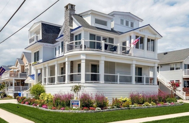 New construction, single-family home boasts 5 bedrooms and 5.2 baths, offering luxury and comfort