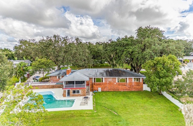 NEW LISTING! Beautiful Lake View Retreat Drivable to Theme Parks