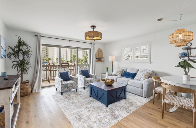 New Owner Special! Stylish Riverfront Condo with Pool & Beach Access