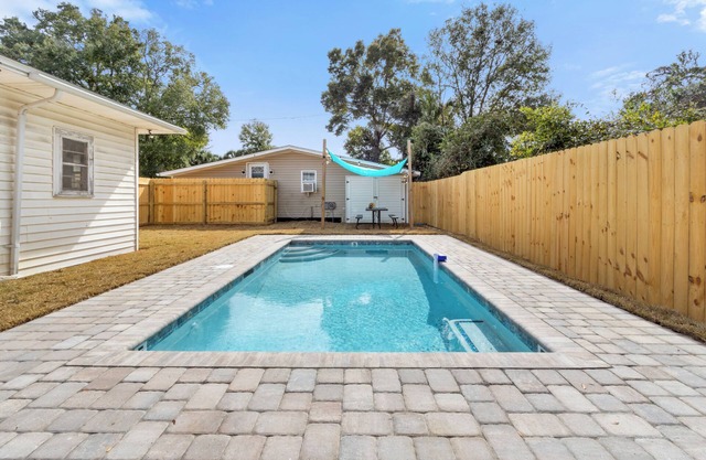 NEW POOL NOW AVAILABLE FOR USE! Unit was meticulously furnished to give a coastal/farm house vibe