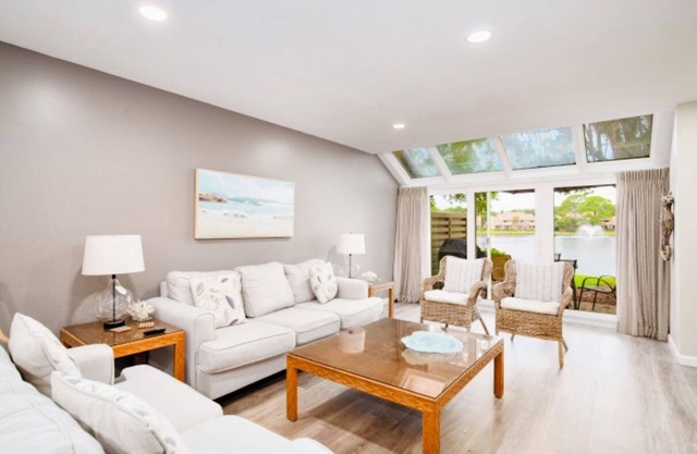 Newly Renovated! Idyllic Lake Views, Golf Cart Included, Beach Close By!