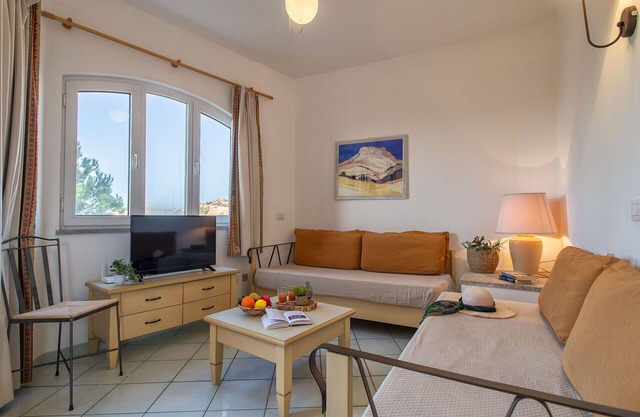 Nice apartment for 4 guests with WIFI, A/C, pool, TV, terrace and pets allowed