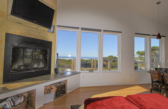 Ocean- & sunset-view home with wall of windows & easy beach access -dog-friendly