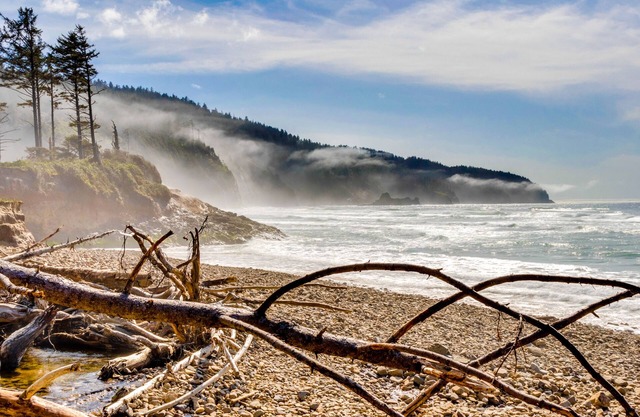 Ocean-view home overlooking Netarts Bay with deck & hot tub