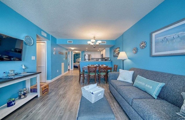 Oceanfront Bliss – Bright Blue Condo with Balcony & Beach Views