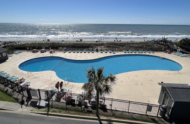 Oceanfront condo incredible views enjoy breakfast on balcony! Window in bedroomn