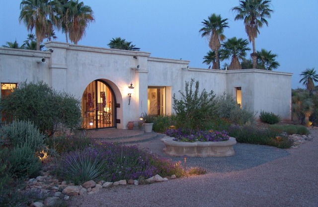 Old world charm and seclusion within an oasis in the Sonoran desert .