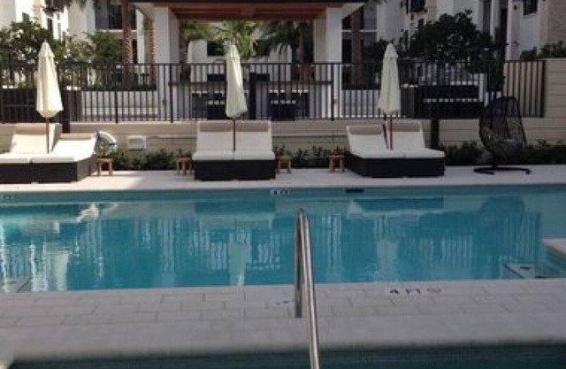 Olde Naples, 600 ft lanai, built in 2015 condo unit w/elevator & secure garage.