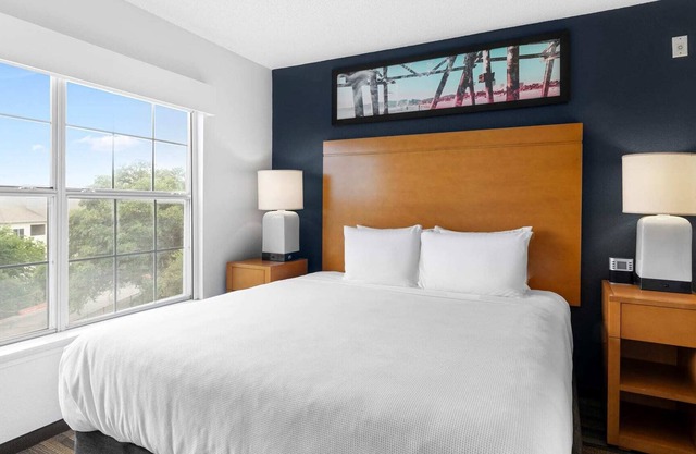 One Bedroom King Suite - Domain Area with a Pool