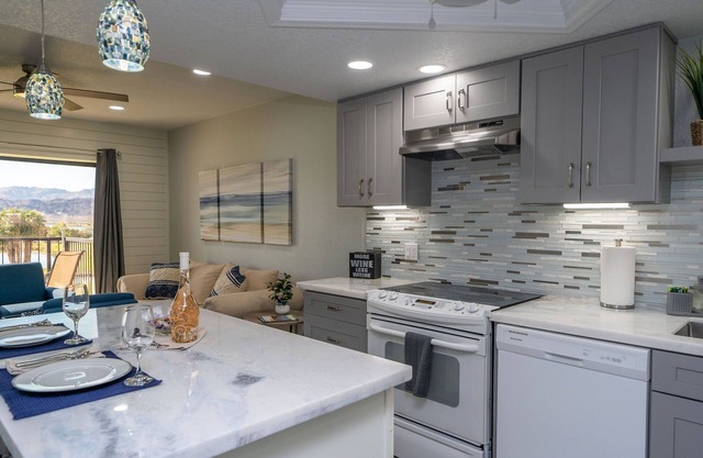 "Open NOW!" Newly Remodeled Luxury Condo. Centrally located.