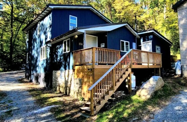 Outdoor hot tub & indoor soaking tub, bonfire pit, picnic area, foosball & more