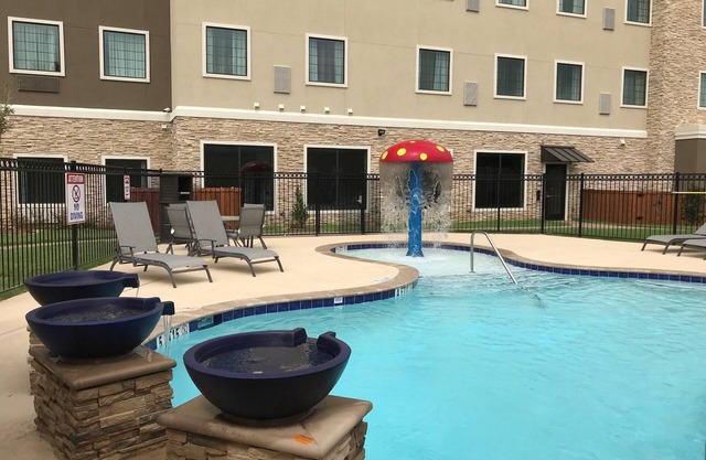 Outdoor Pool + Free Wi-Fi, Free Breakfast | Fully Equipped King Suite with a Balcony