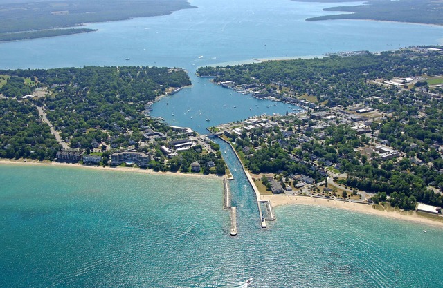 Penthouse Condo on the channel. Stunning views, walk to beach, watch the boats.