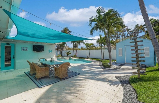 Pet friendly house with a heated pool and hot tub!