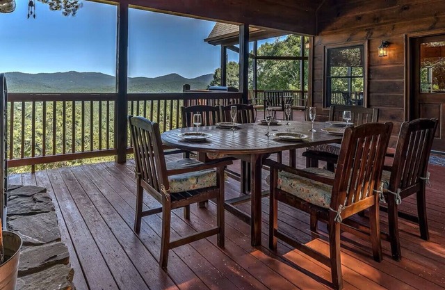 Pet-friendly, mountain view cabin rent with an outdoor fireplace, hot tub and pool table. Free WiFi