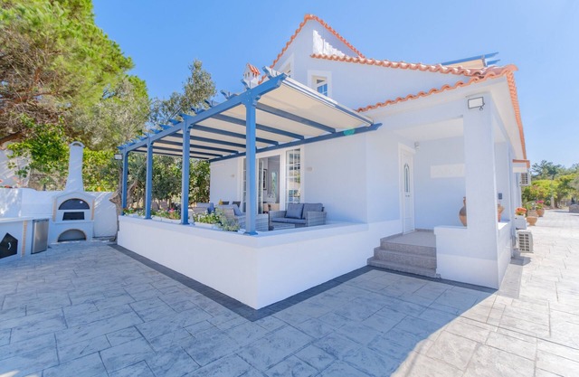 Picturesque gated beach-front private villa on lush estate!