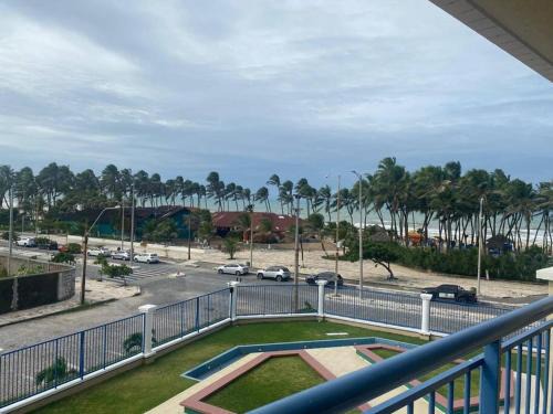 Praia e Conforto ap frente o mar