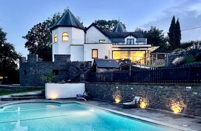 Private 7-bedroom villa with hot-tub, heated pool and bar.