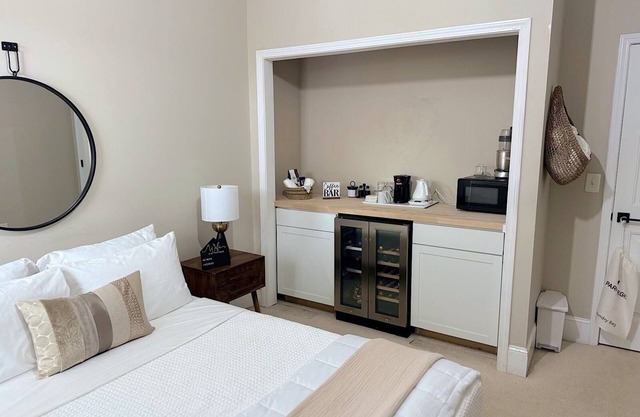 Private bed and bathroom with partition and own entrance.