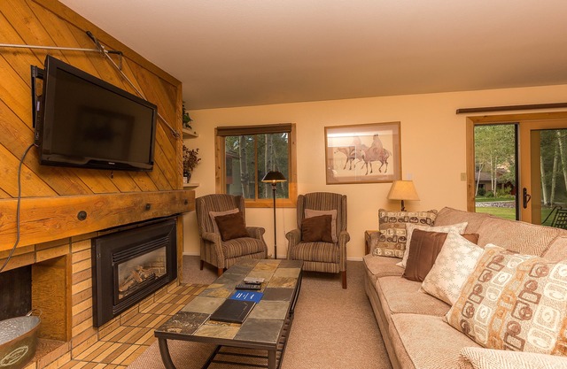Private Deck Looks Out to Courtyard, Easy Access to Shuttle to All of Resort!