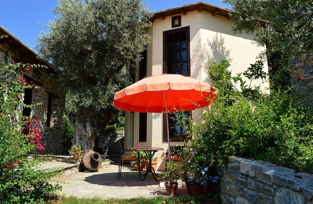 Quaint character cottage in traditional Greek village