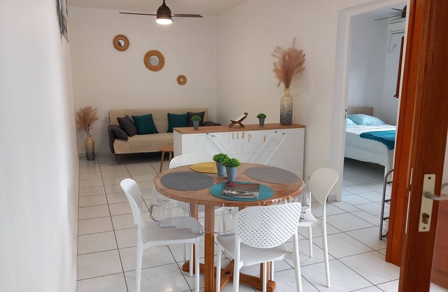 Quiet apartment with swimming pool and lush greenery lulled by birdsong