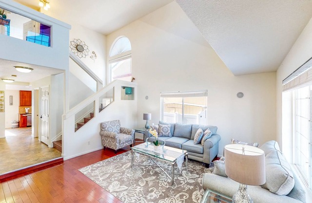 Quiet Home near Airport with Garage Parking, Fenced Yard & Full Kitchen