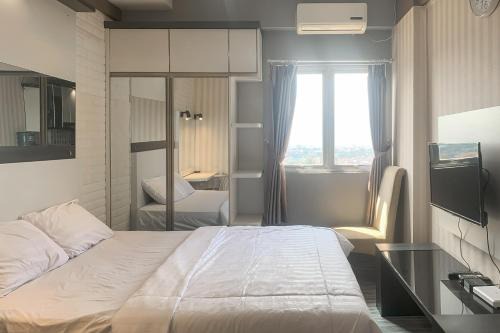 RedLiving Apartemen The Suites Metro - KS 2 Property Tower E