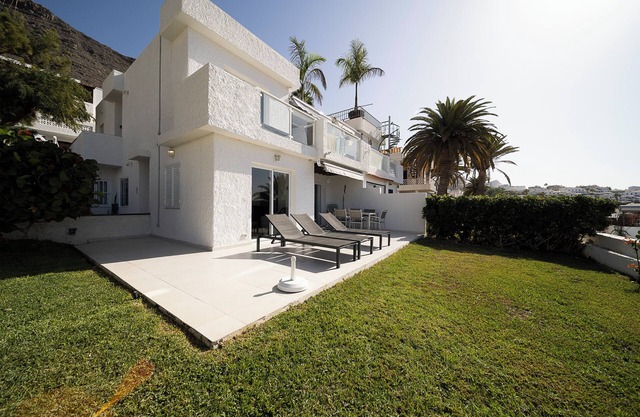 Refurbished 2-bed in popular Los Gigantes w/private garden, terrace & sea views